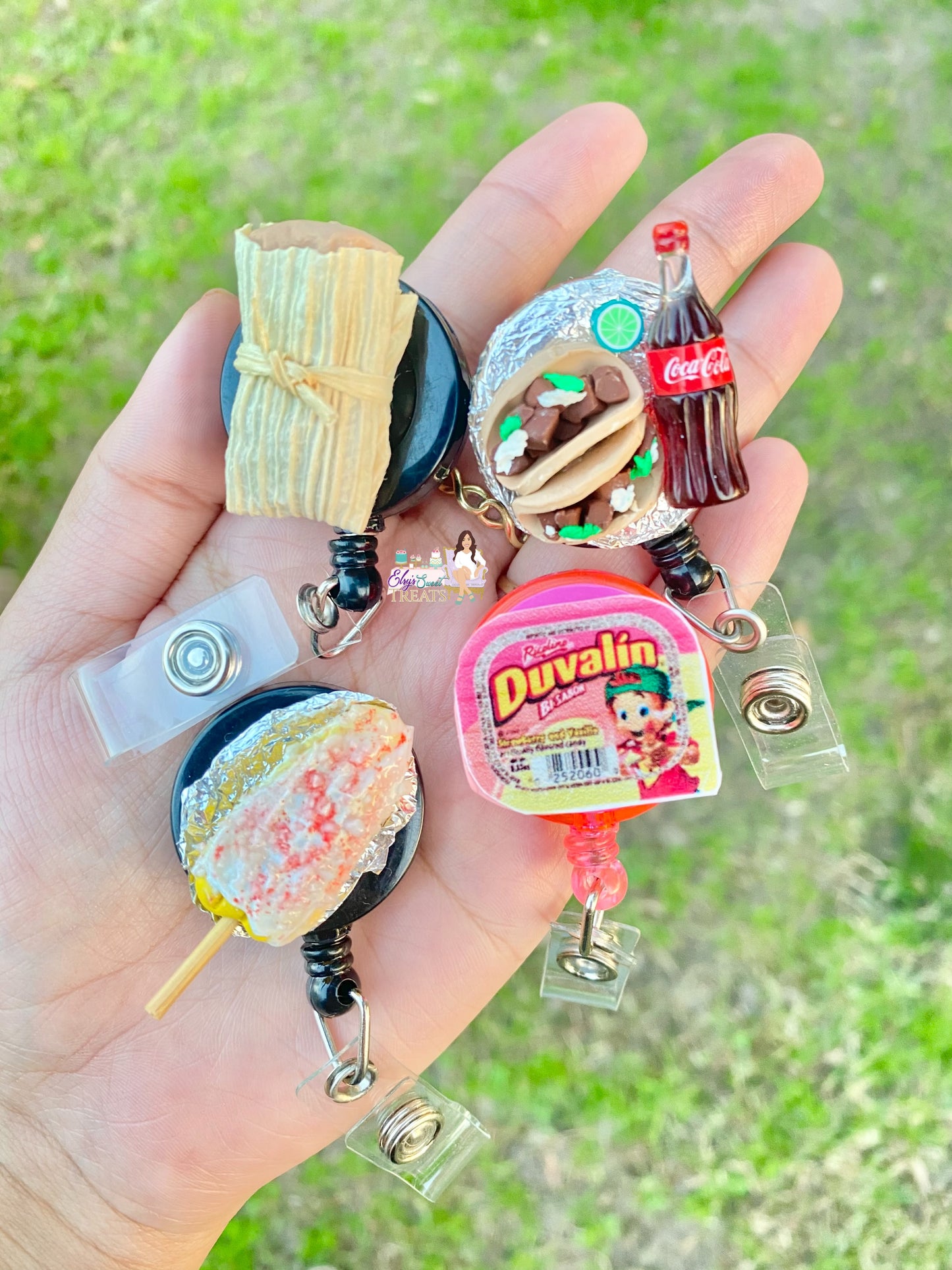 Elote , tamale, duvalin , and tacos with coke badge reels